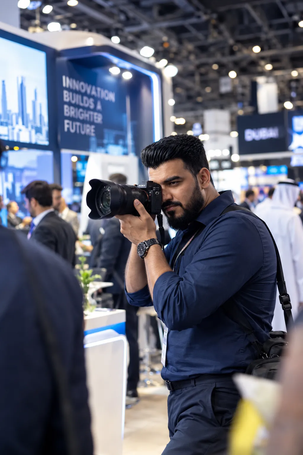 international photographer mashhood arshad taking pictures at a busy exhibition in the middle east 